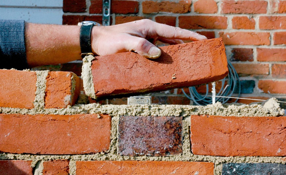laying bricks business